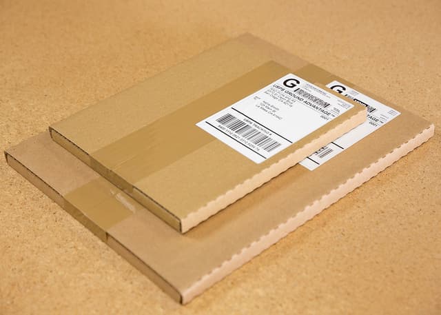 Small orders for 8x10 and 11x14 prints ship in custom boxes that are slightly bigger than the print and are about 1/2 inch thick.